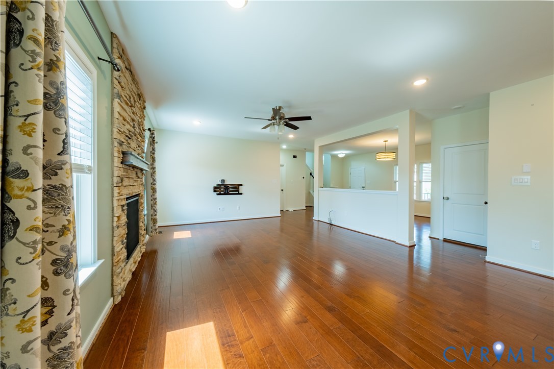 15607 Crowden Road Chesterfield, VA 23832 - Photo 16 of 57 Spacious living area featuring wood-finish floorin
