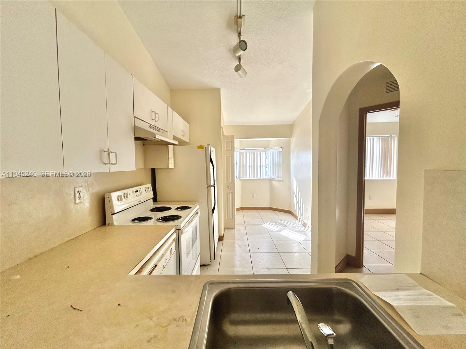 1250 Southeast 29th Street, Unit 20258 Homestead, FL 33035 - Photo 7 of 13 a view of a kitchen with a sink