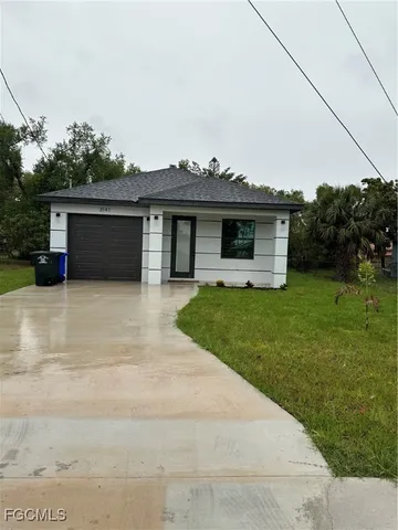 a front view of house with yard