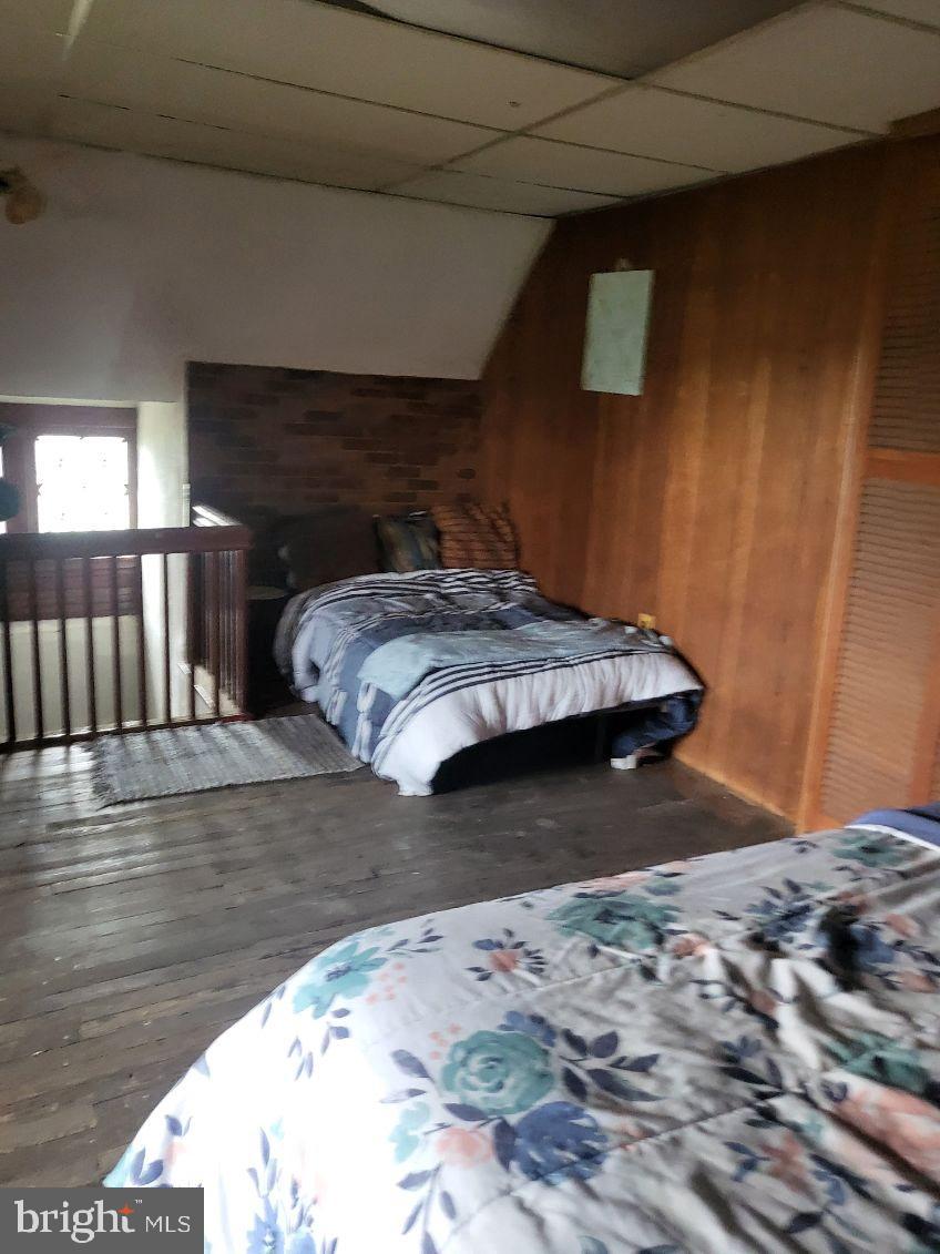 413 Delaware Street Monessen, PA 15062 - Photo 3 of 19 Cozy loft retreat with rustic charm.