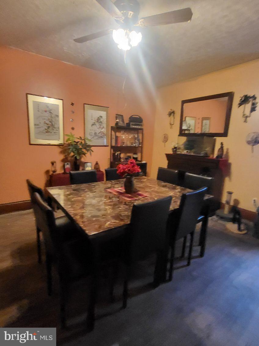 413 Delaware Street Monessen, PA 15062 - Photo 6 of 19 Inviting dining space with warm ambiance.