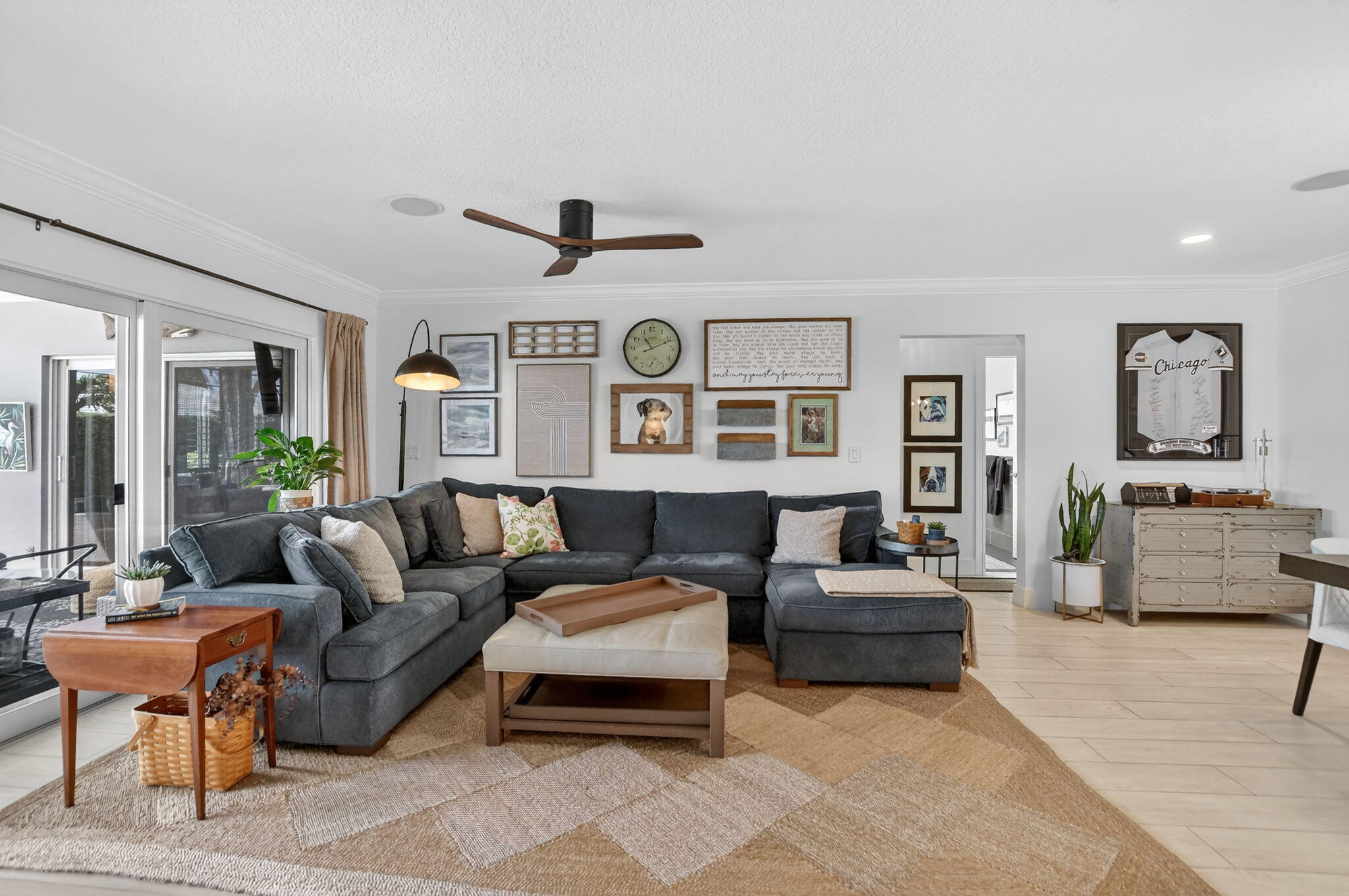 1388 Walnut Terrace Boca Raton, FL 33486 - Photo 11 of 74 a living room with furniture and a large window