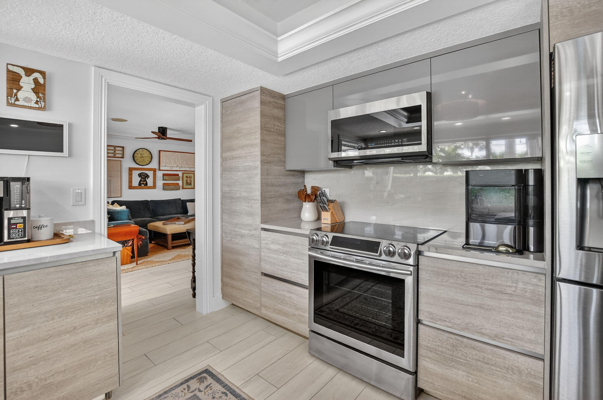 1388 Walnut Terrace Boca Raton, FL 33486 - Photo 18 of 74 a kitchen with a stove and a microwave