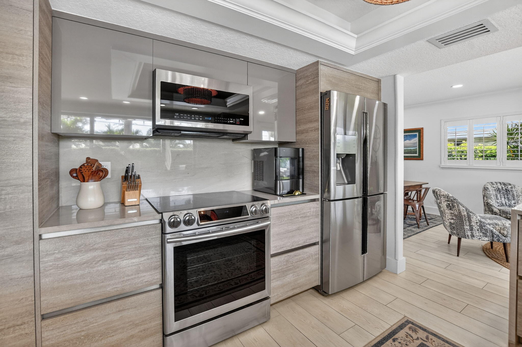 1388 Walnut Terrace Boca Raton, FL 33486 - Photo 19 of 74 a kitchen with a stove microwave and refrigerator
