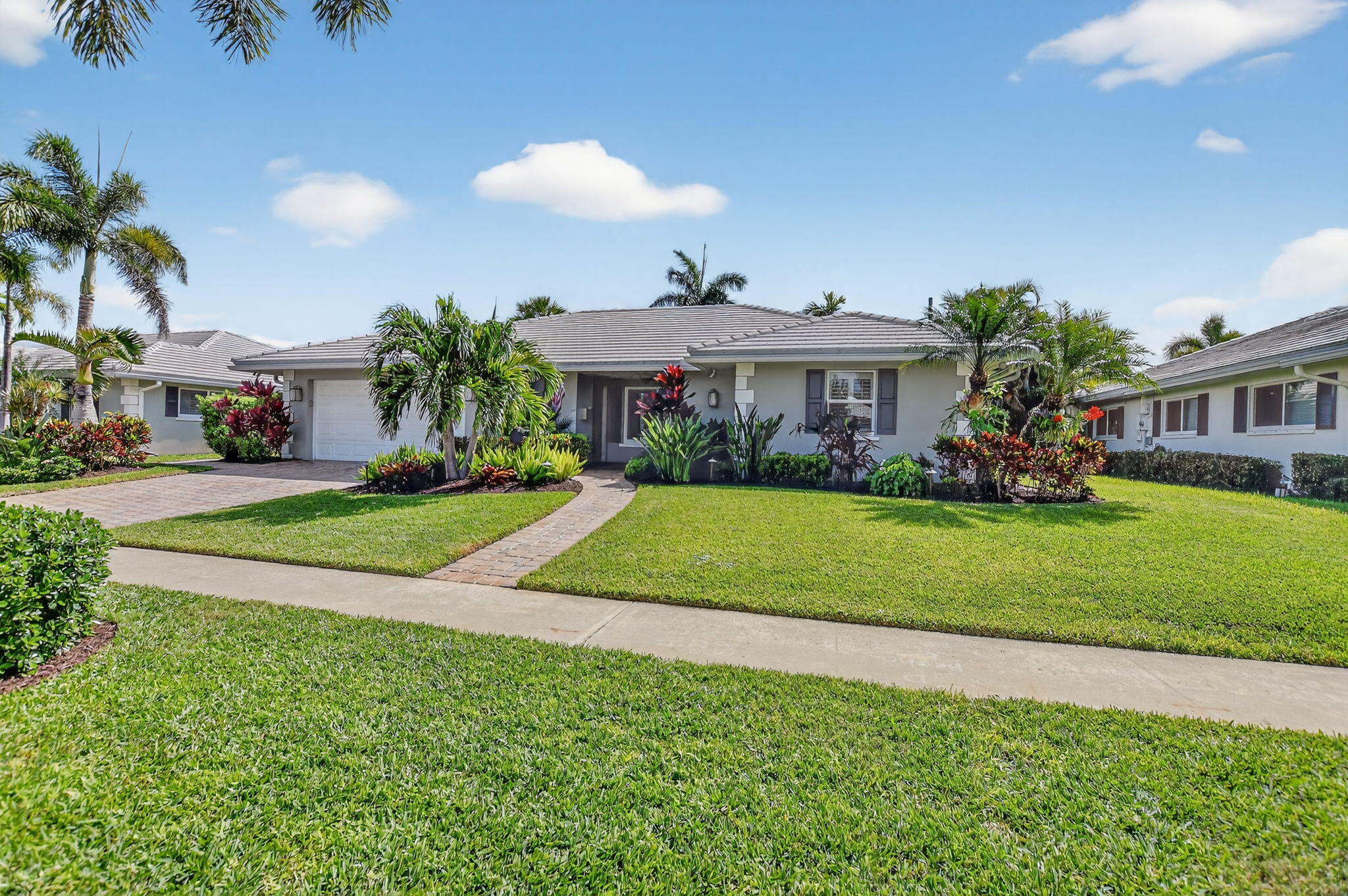 1388 Walnut Terrace Boca Raton, FL 33486 - Photo 2 of 74 a view of house with outdoor space and swimming pool