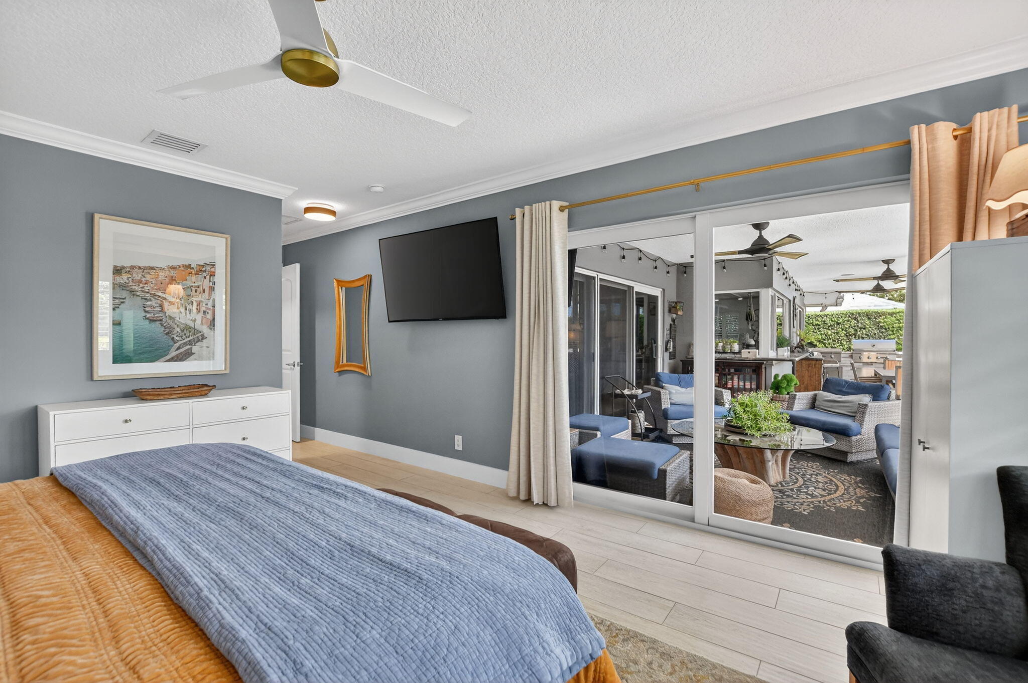 1388 Walnut Terrace Boca Raton, FL 33486 - Photo 29 of 74 a bedroom with furniture and a flat screen tv