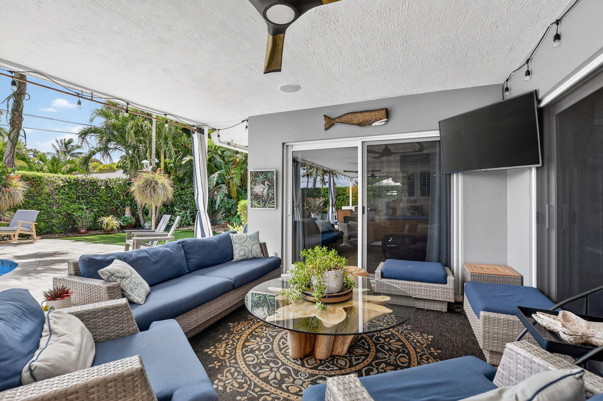 1388 Walnut Terrace Boca Raton, FL 33486 - Photo 42 of 74 a living room with furniture and a large window