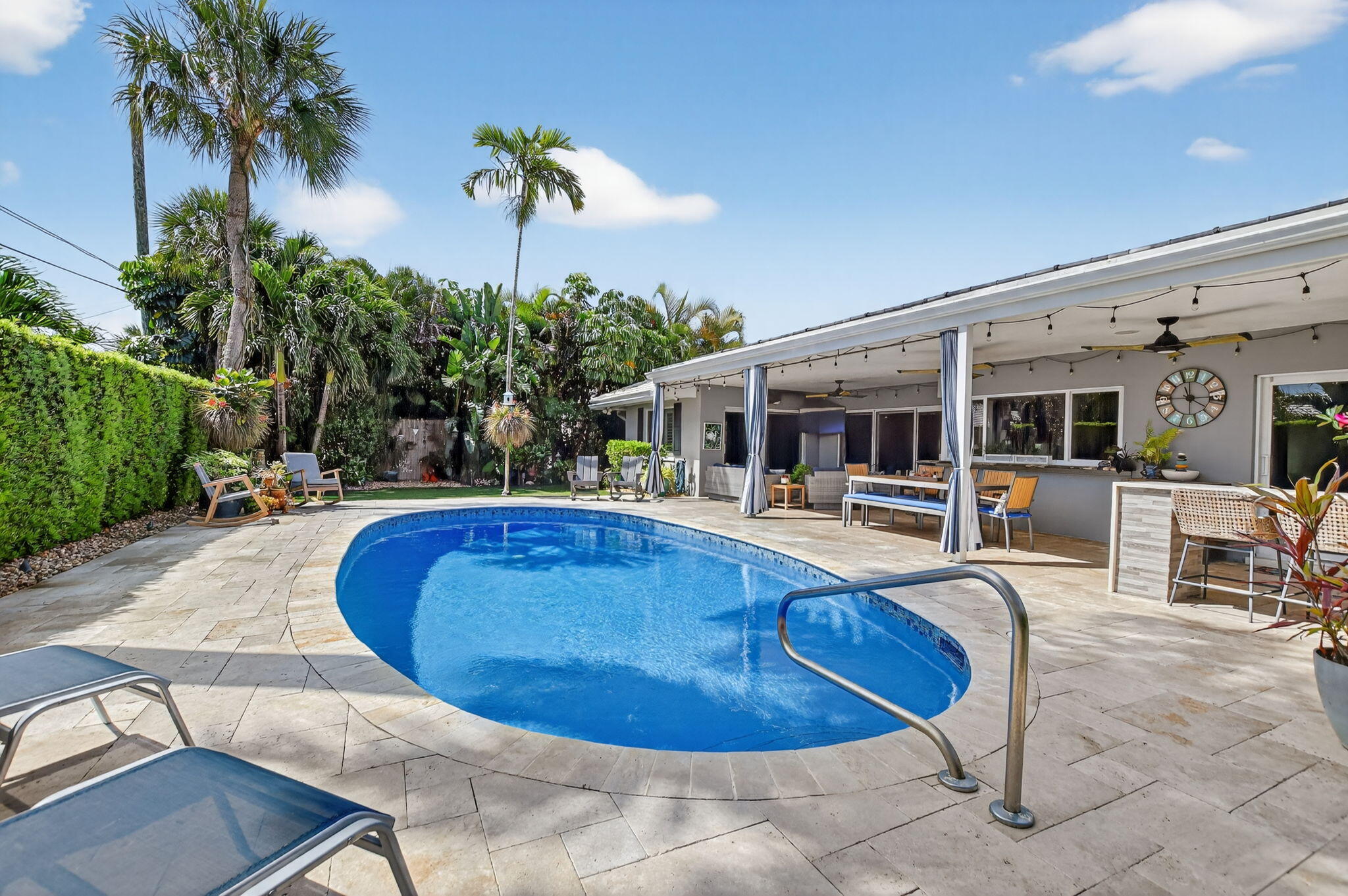 1388 Walnut Terrace Boca Raton, FL 33486 - Photo 49 of 74 a view of a swimming pool with chairs