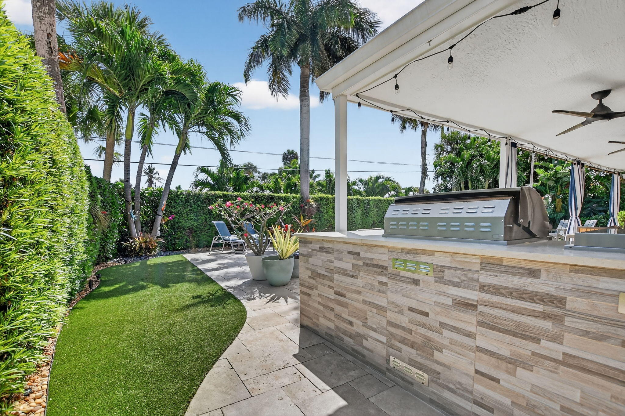 1388 Walnut Terrace Boca Raton, FL 33486 - Photo 56 of 74 a view of a backyard with potted plants