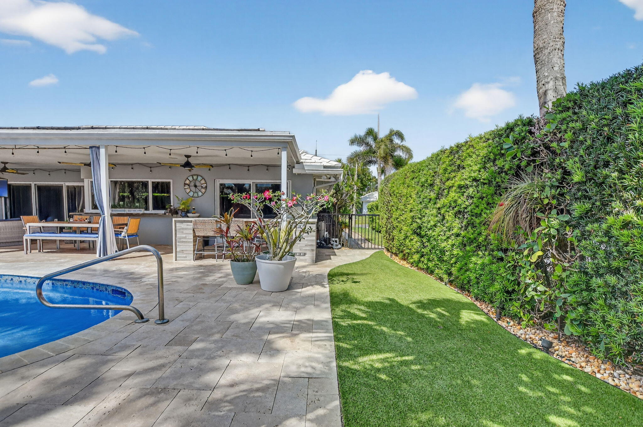 1388 Walnut Terrace Boca Raton, FL 33486 - Photo 57 of 74 a view of a swimming pool with a patio