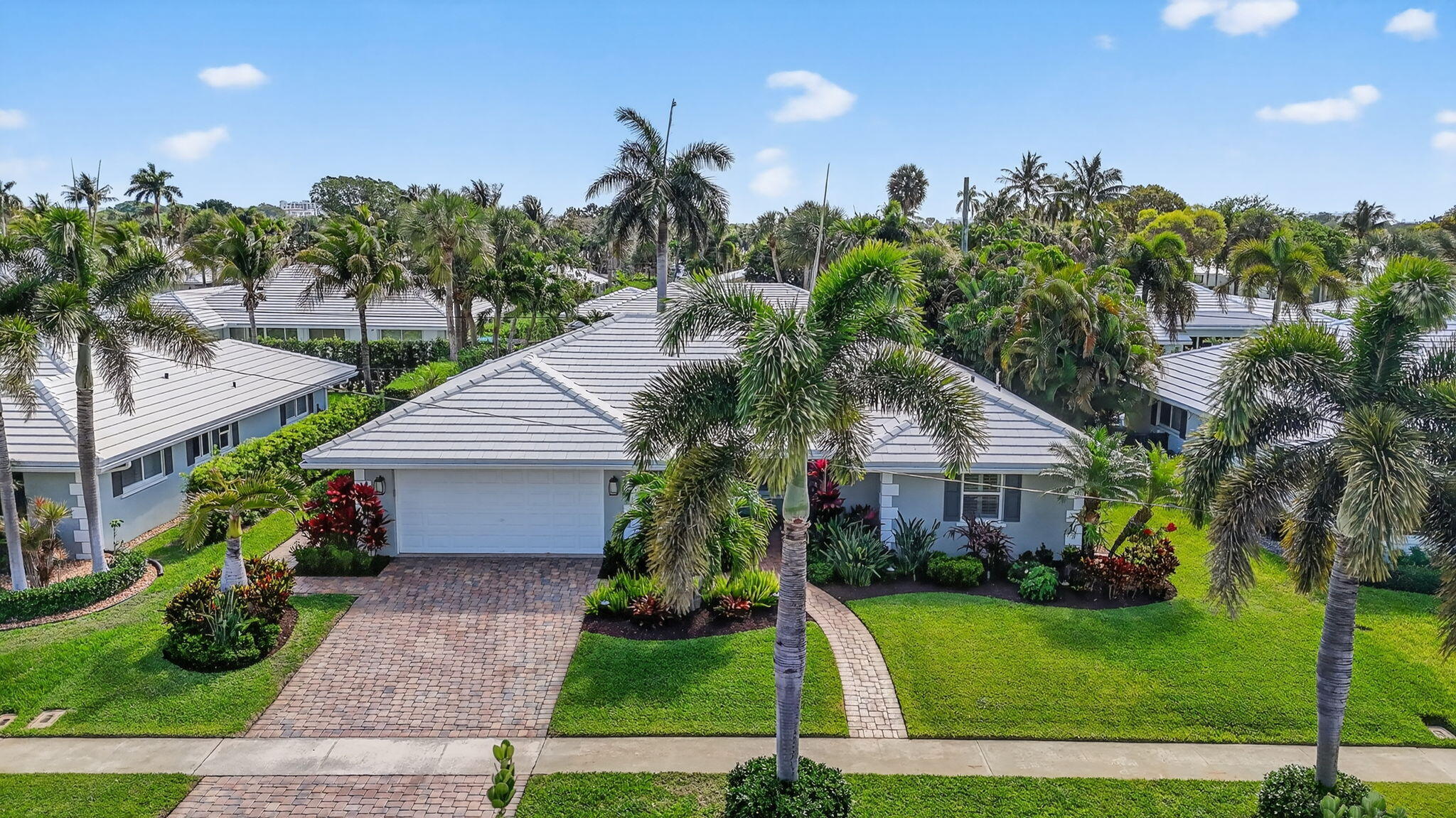 1388 Walnut Terrace Boca Raton, FL 33486 - Photo 59 of 74 a front view of a house with a garden