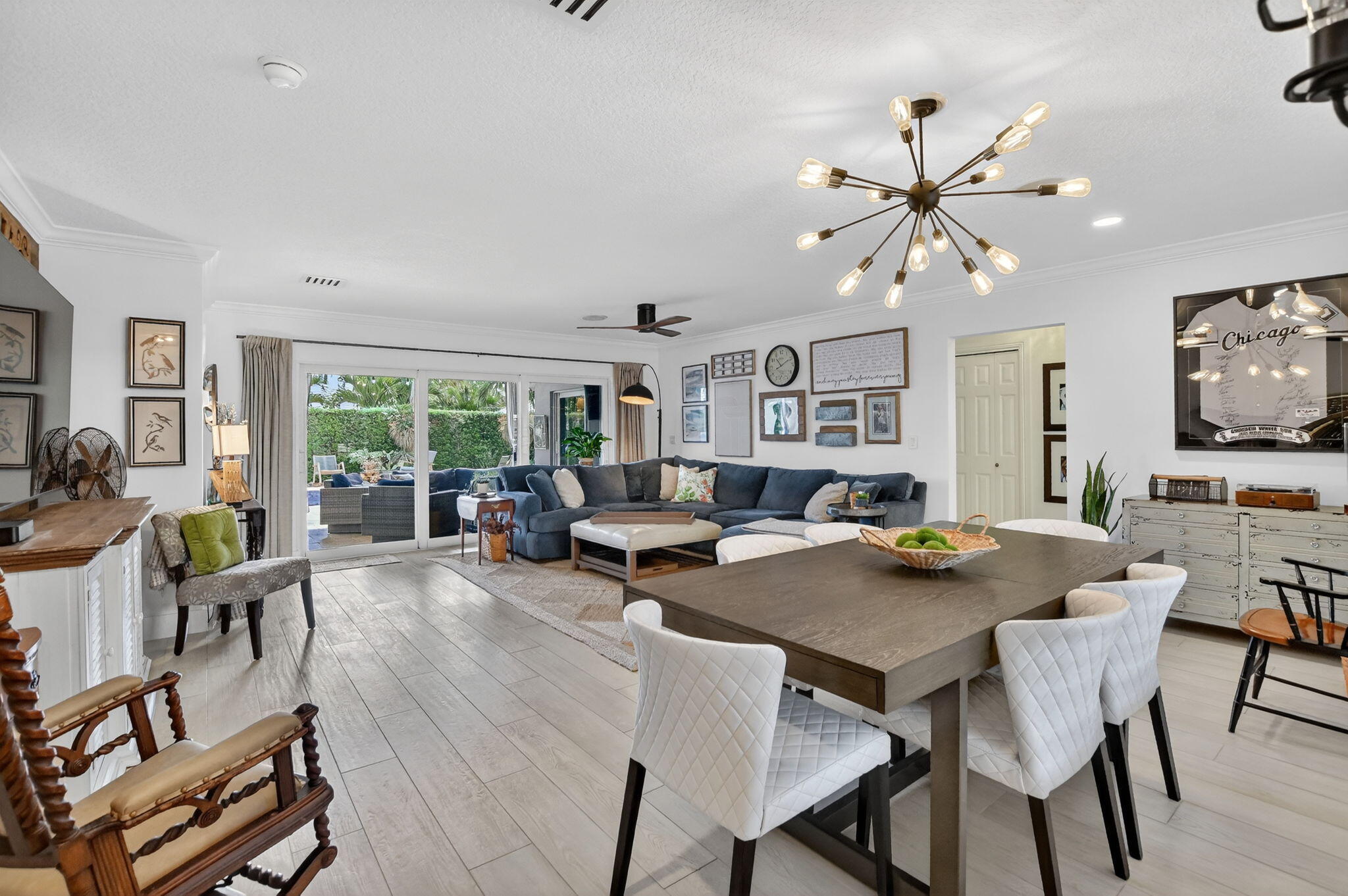 1388 Walnut Terrace Boca Raton, FL 33486 - Photo 6 of 74 a view of a dining room with furniture and a livingroom
