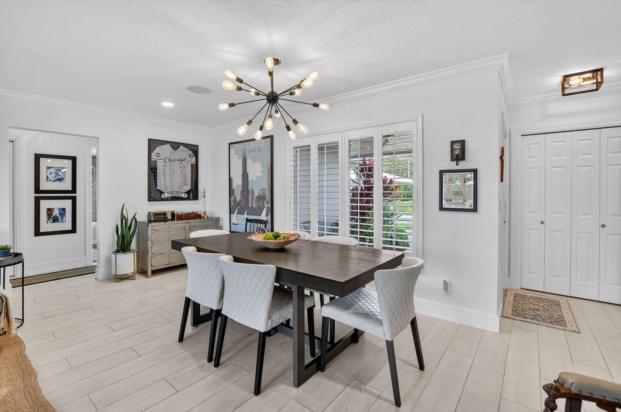 1388 Walnut Terrace Boca Raton, FL 33486 - Photo 7 of 74 a view of a a dining room with furniture window and wooden floor