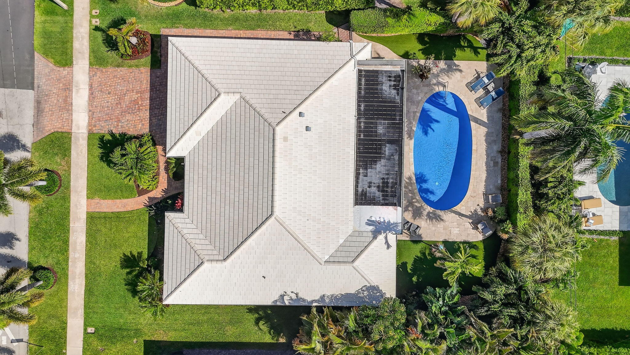 1388 Walnut Terrace Boca Raton, FL 33486 - Photo 74 of 74 a aerial view of a house with swimming pool and a yard
