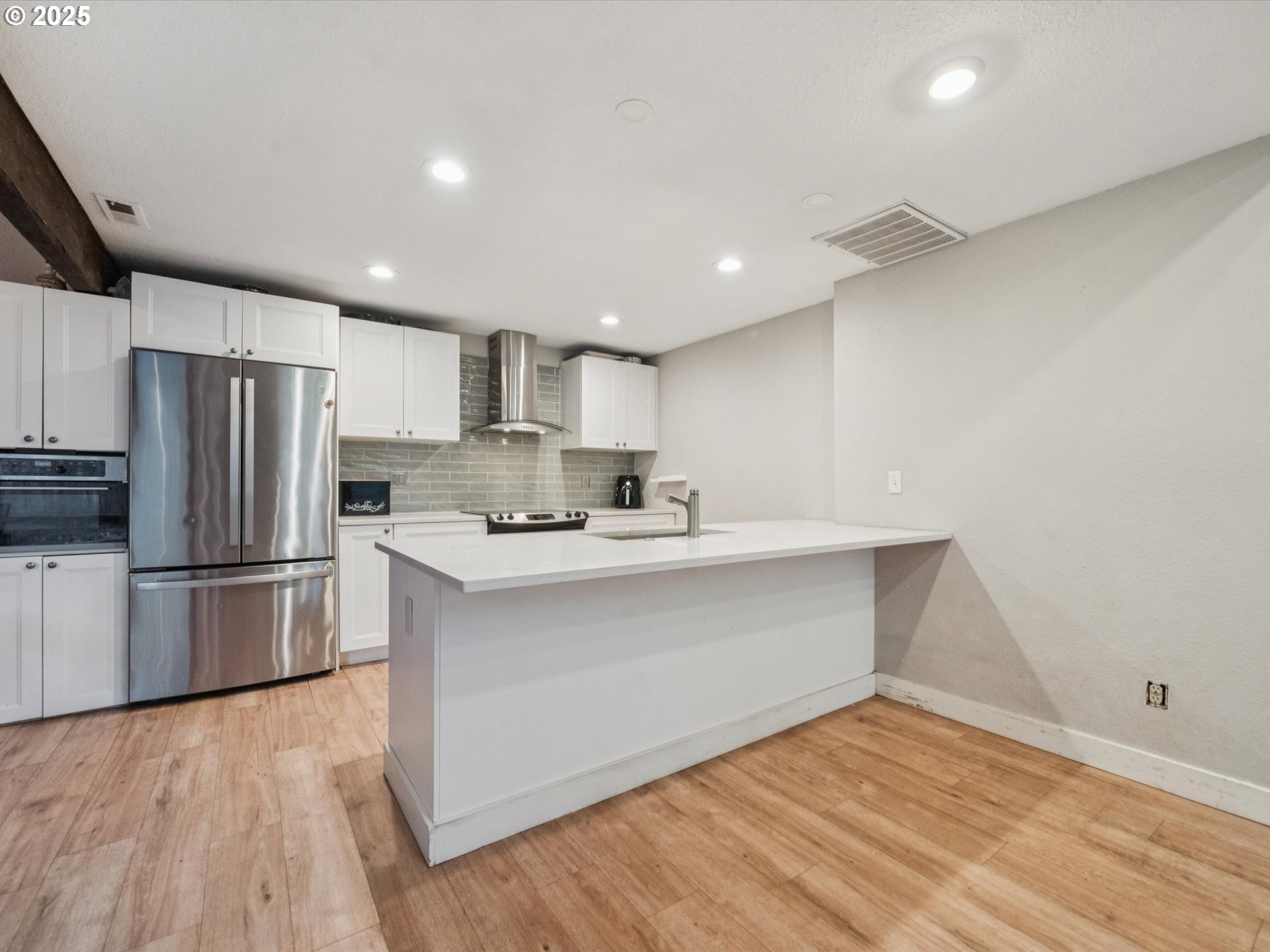 5100 Southwest 153rd Avenue Beaverton, OR 97007 - Photo 21 of 39 a kitchen with a refrigerator and a sink