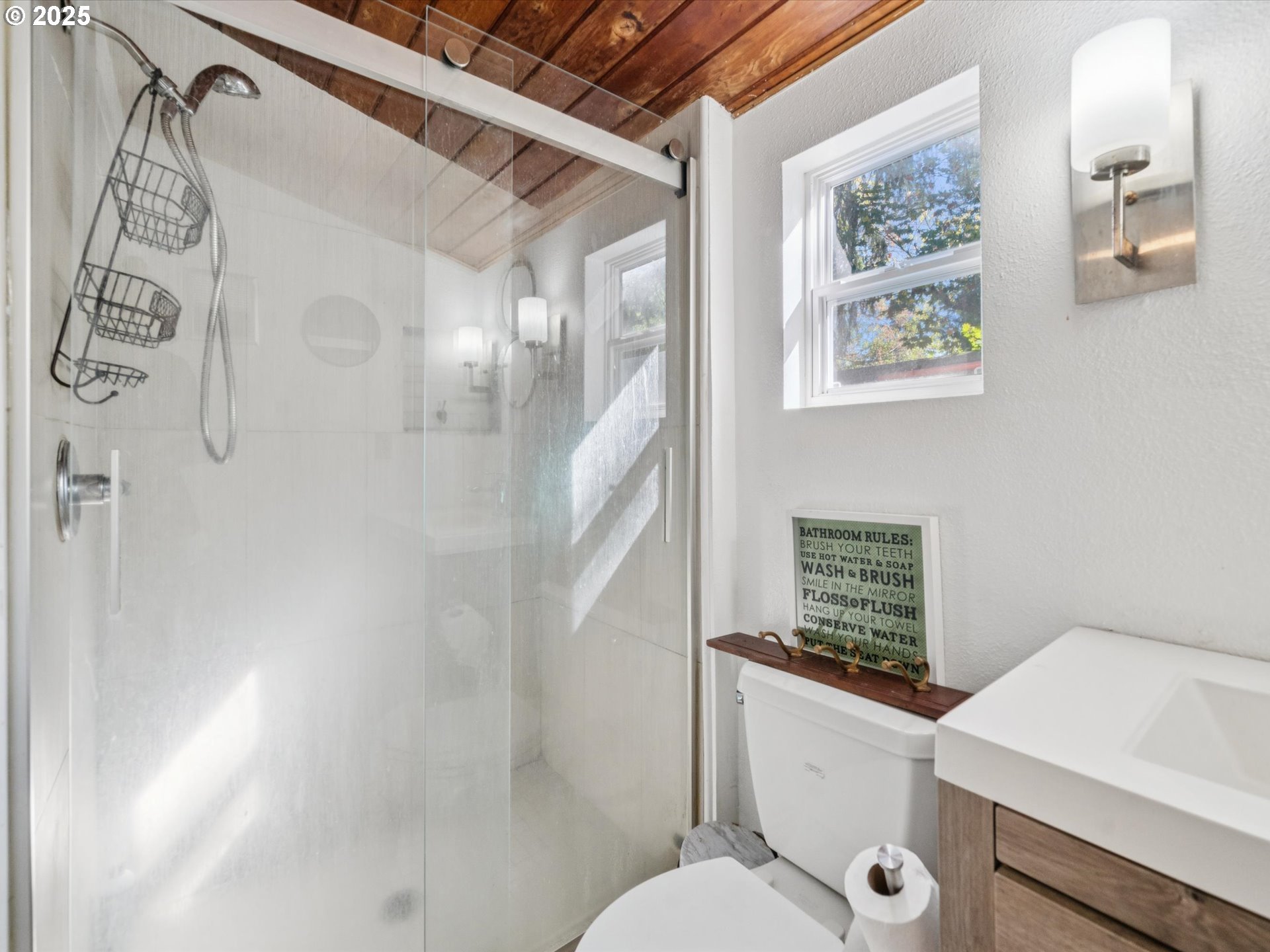 5100 Southwest 153rd Avenue Beaverton, OR 97007 - Photo 29 of 39 a bathroom with a sink toilet and shower