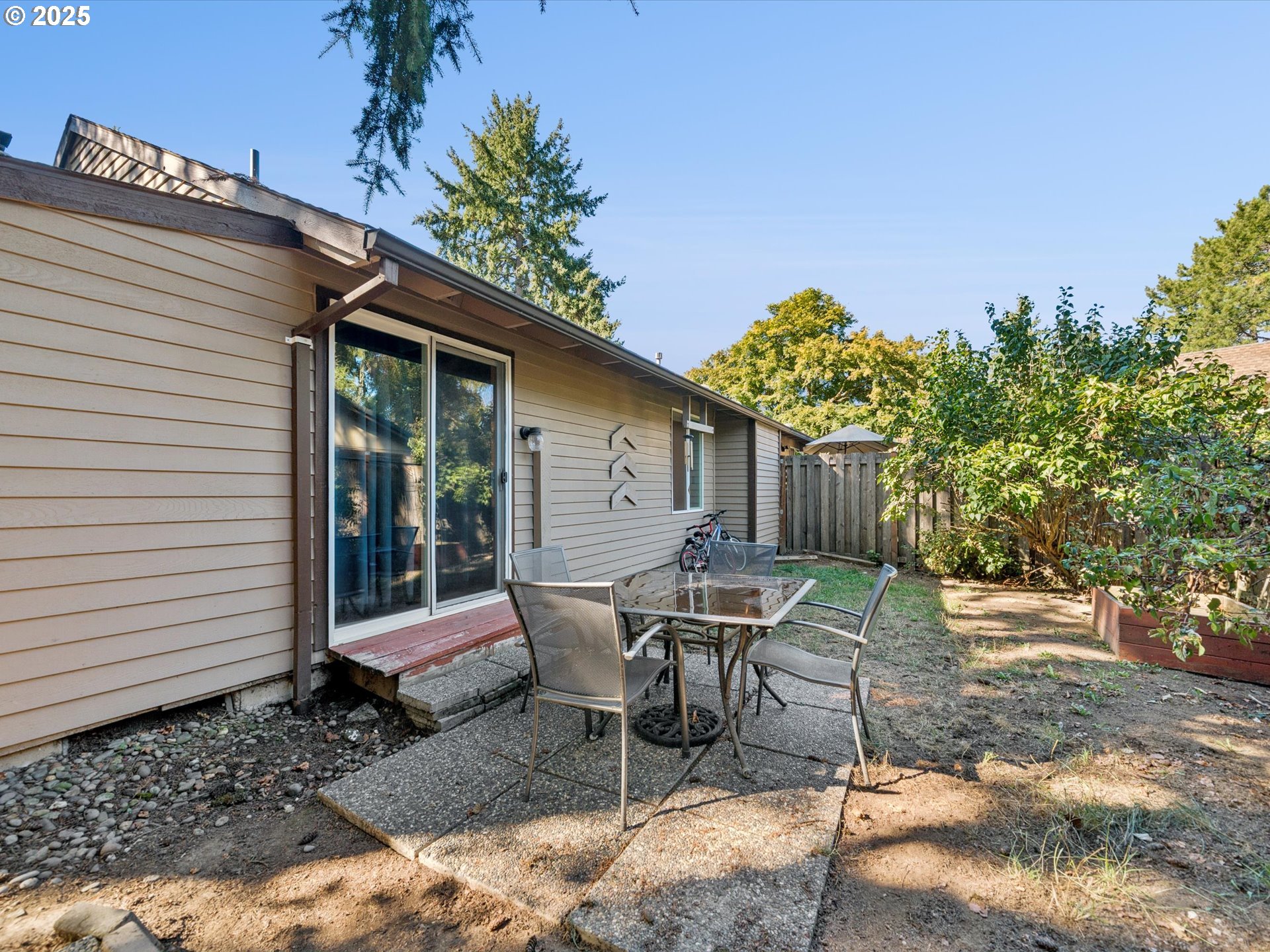 5100 Southwest 153rd Avenue Beaverton, OR 97007 - Photo 34 of 39 a view of a wooden bench sitting in backyard