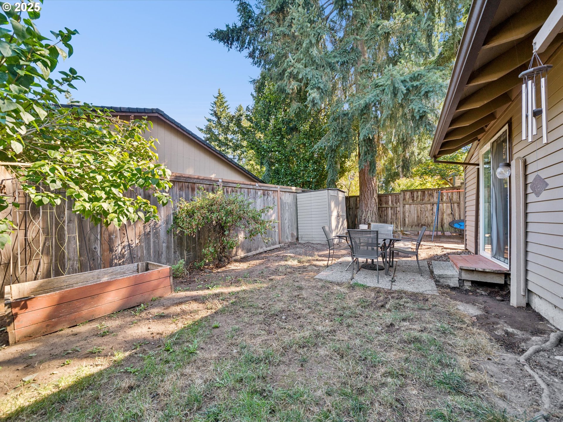 5100 Southwest 153rd Avenue Beaverton, OR 97007 - Photo 35 of 39 a view of a outdoor space with a patio and sitting area