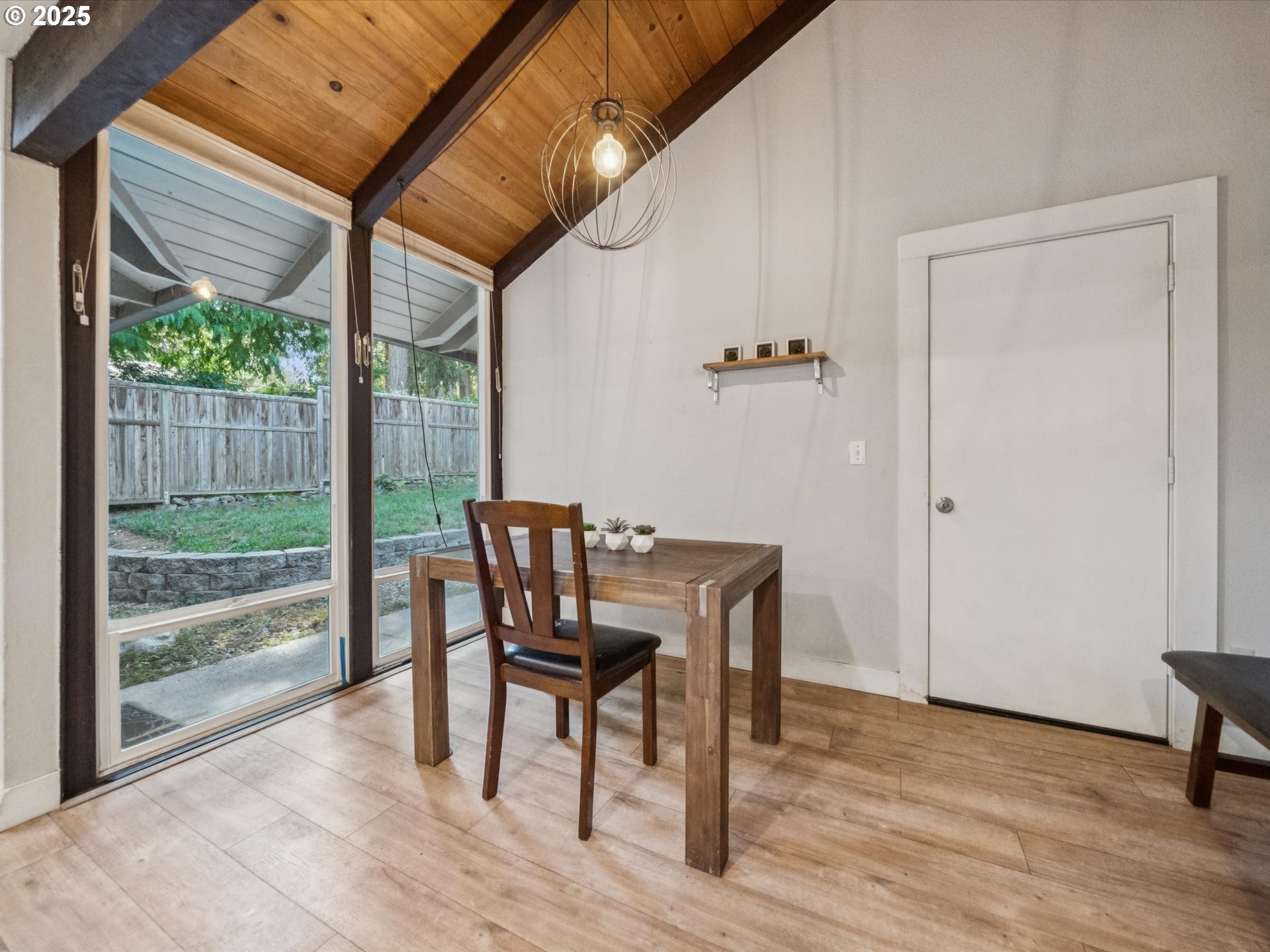 5100 Southwest 153rd Avenue Beaverton, OR 97007 - Photo 5 of 39 a view of a dining room with furniture window and wooden floor
