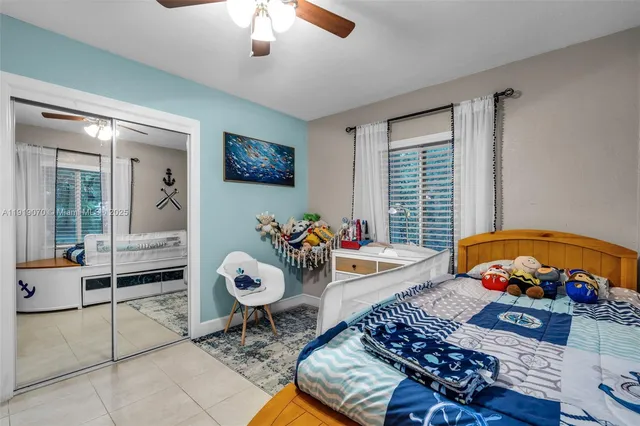 a view of a table and chairs in the garden
