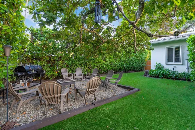 front view of a house with a garden