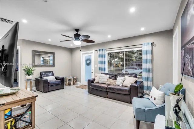 a kitchen with a refrigerator stove and sink
