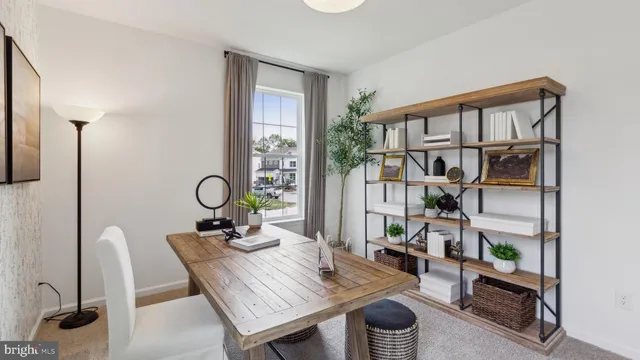 a workspace with furniture and a book shelf