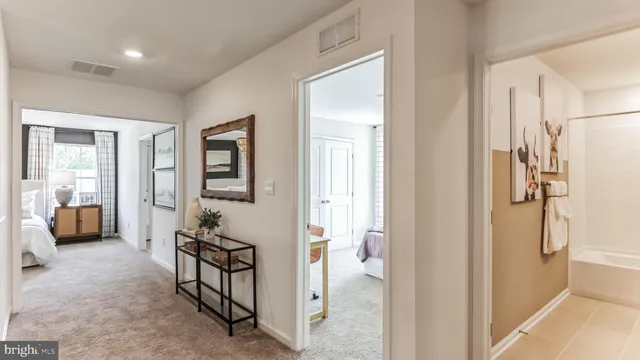 a view of a livingroom with furniture and windows
