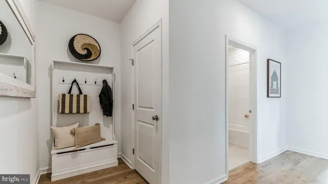 a view of a livingroom with furniture and entryway