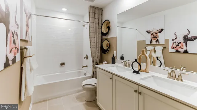 a bathroom with a sink a toilet and a bathtub