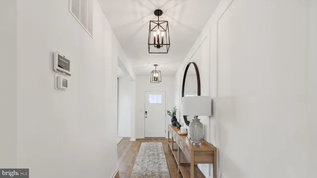 a view of a bedroom with bed and closet