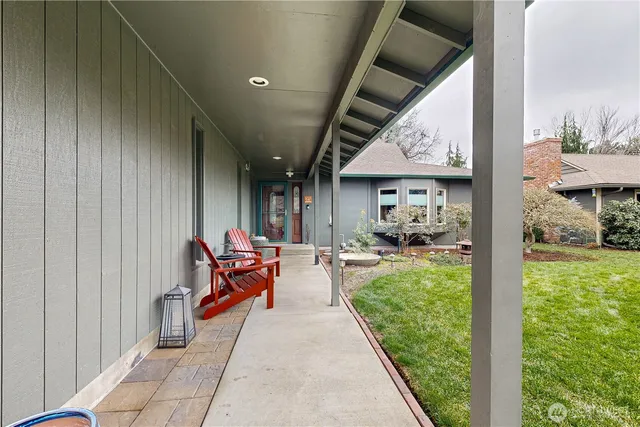 a view of a park with large trees