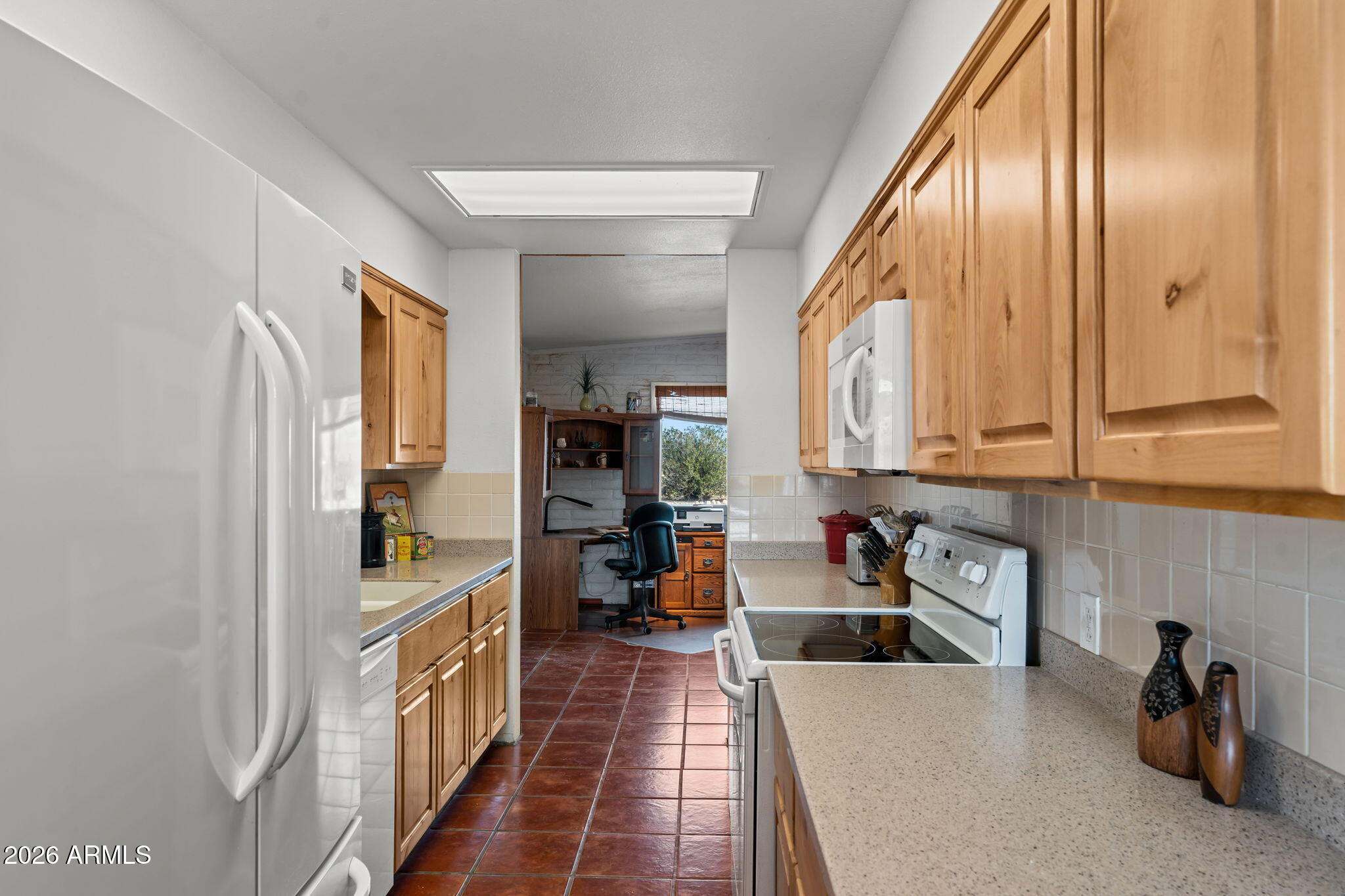 50907 West Iver Road Aguila, AZ 85320 - Photo 19 of 46 a view of a living room and a window