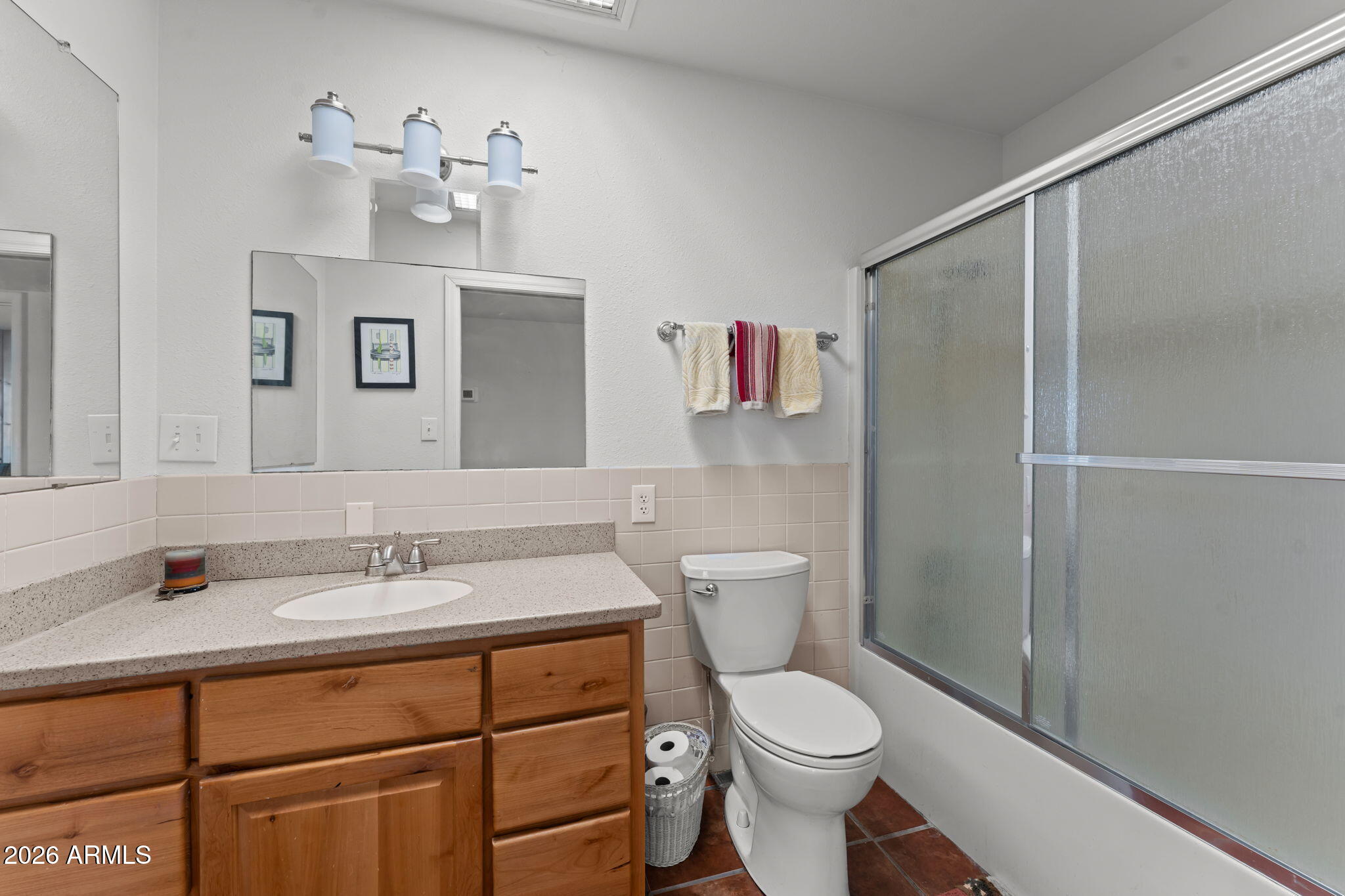 50907 West Iver Road Aguila, AZ 85320 - Photo 21 of 46 a bathroom with a sink toilet and shower