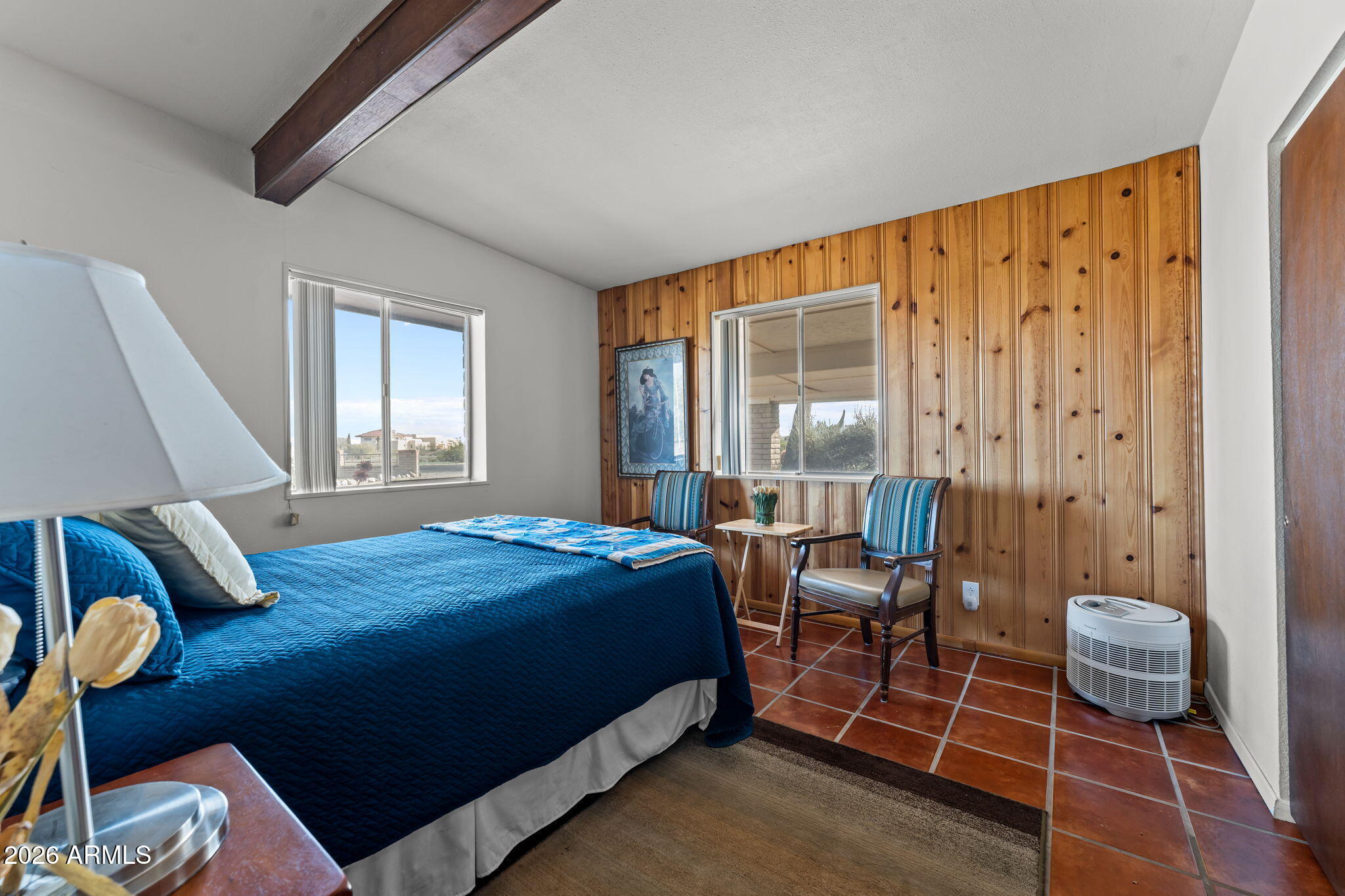 50907 West Iver Road Aguila, AZ 85320 - Photo 22 of 46 a bedroom with a bed and a window