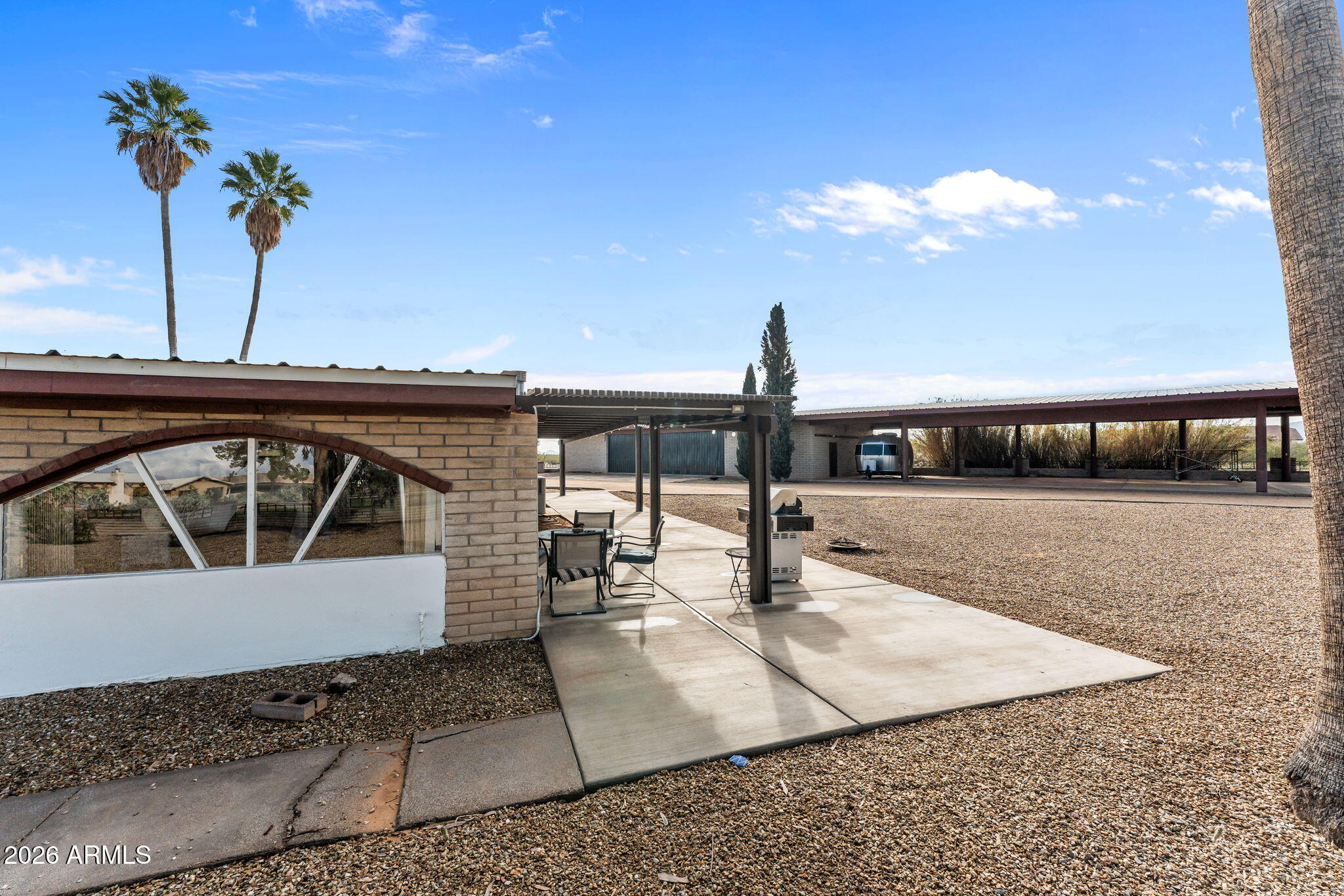 50907 West Iver Road Aguila, AZ 85320 - Photo 27 of 46 a view of a balcony with furniture