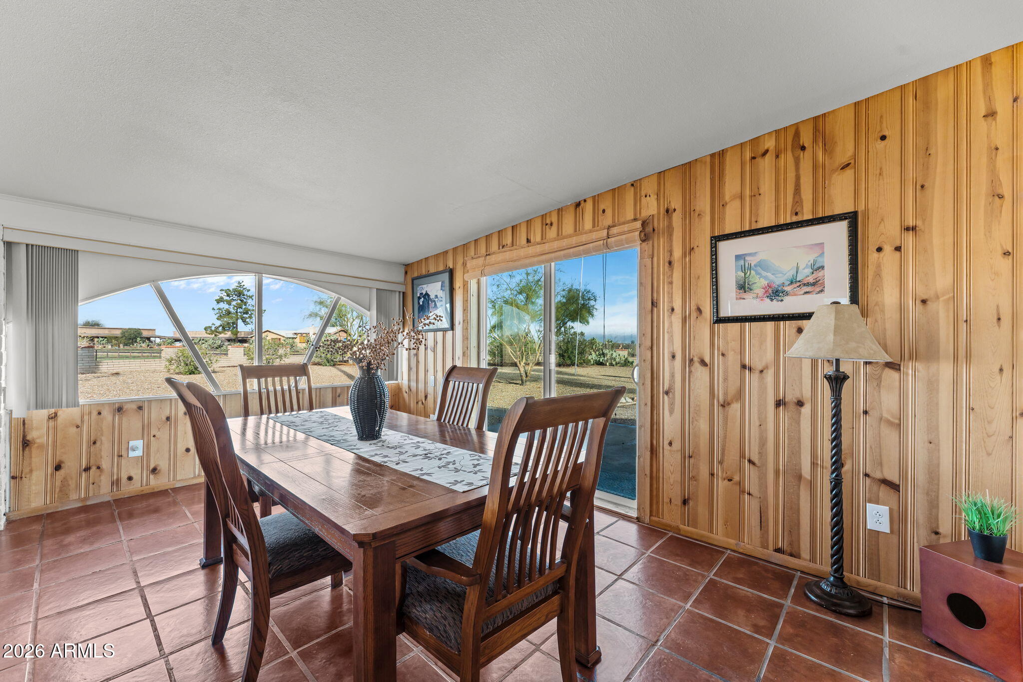 50907 West Iver Road Aguila, AZ 85320 - Photo 9 of 46 a view of a dining room with furniture window and outside view