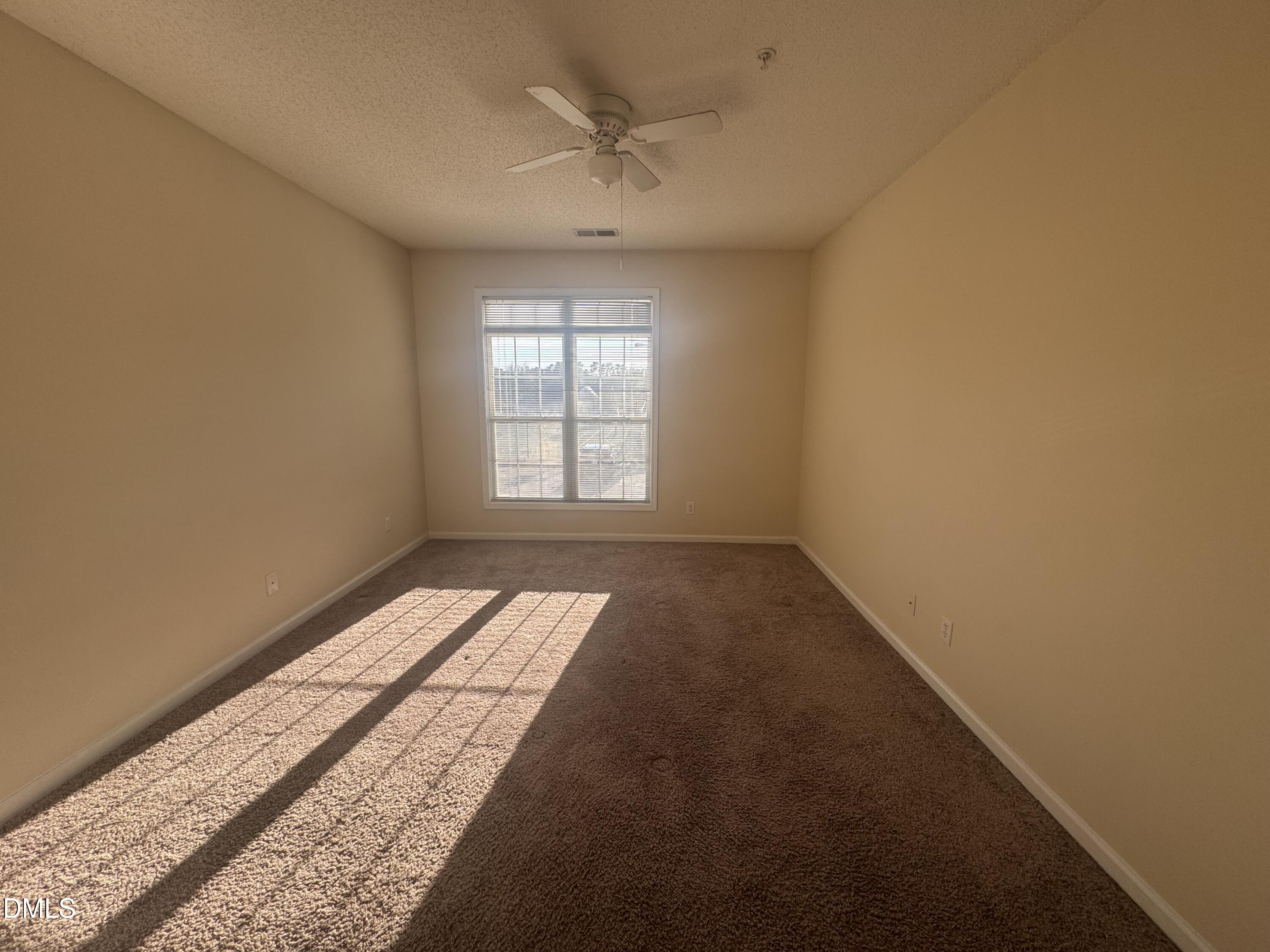 2510 Friedland Place, Unit 202 Raleigh, NC 27617 - Photo 21 of 25 an empty room with a window