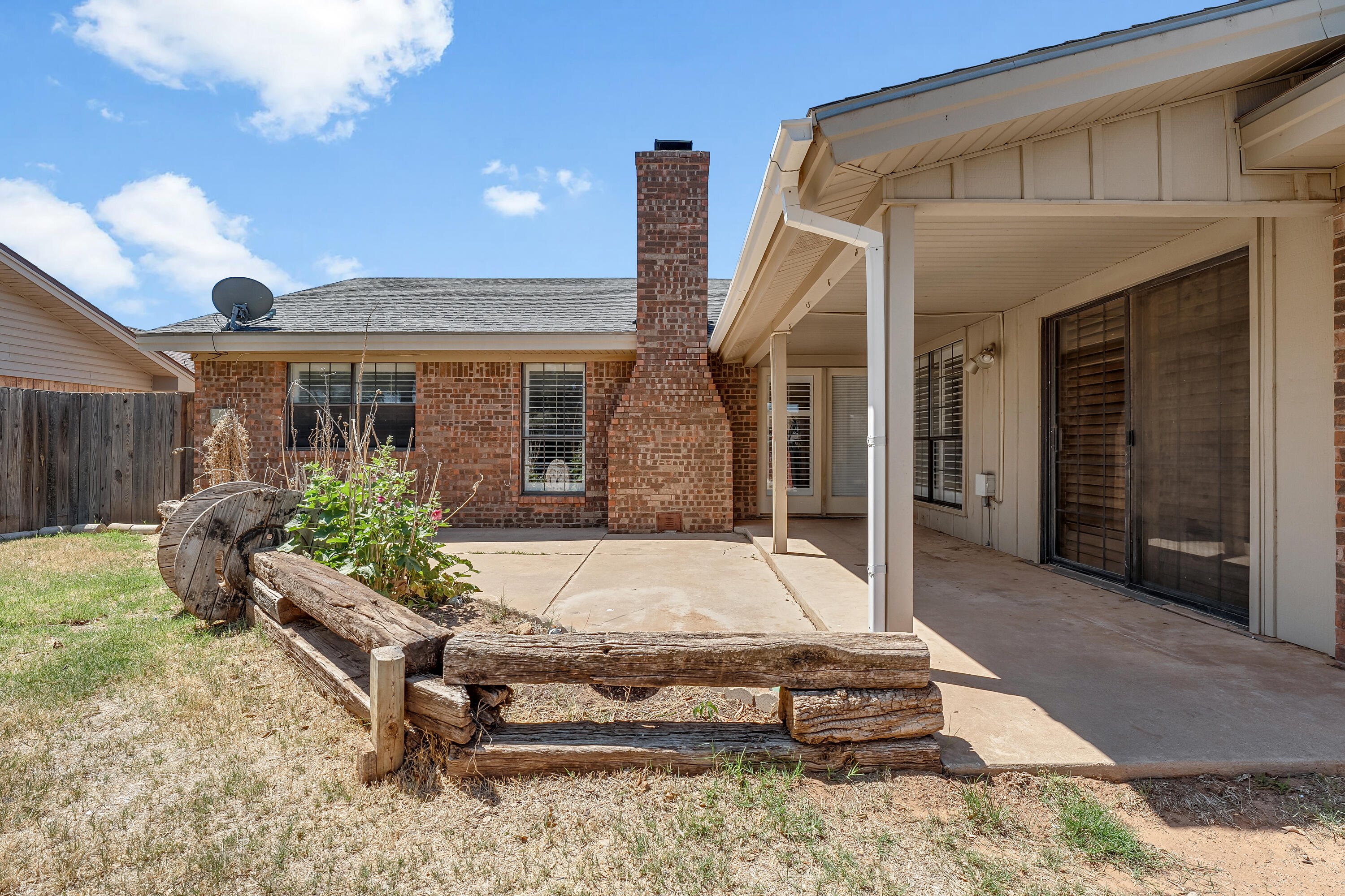 5236 91st Street Lubbock, TX 79424 - Photo 23 of 23 a swimming pool with patio outdoor seating and yard
