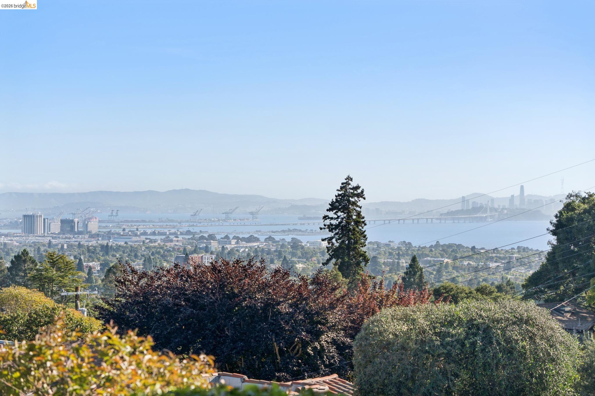 2301 Oak Street Berkeley, CA 94708 - Photo 41 of 61 Expansive water views featuring a distant cityscape, bridge, and surrounding hills