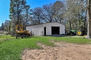 30263 Old Joseph Road Hockley, TX 77447 - Photo 10 of 10 a view of a house with backyard