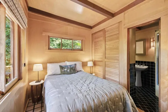 a living room with furniture oven and wooden floor