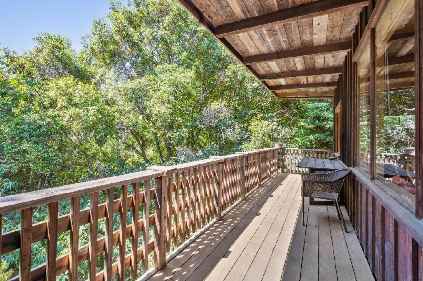 10026 Sycamore Canyon Road Big Sur, CA 93920 - Photo 36 of 67 a view of balcony with couch and wooden floor