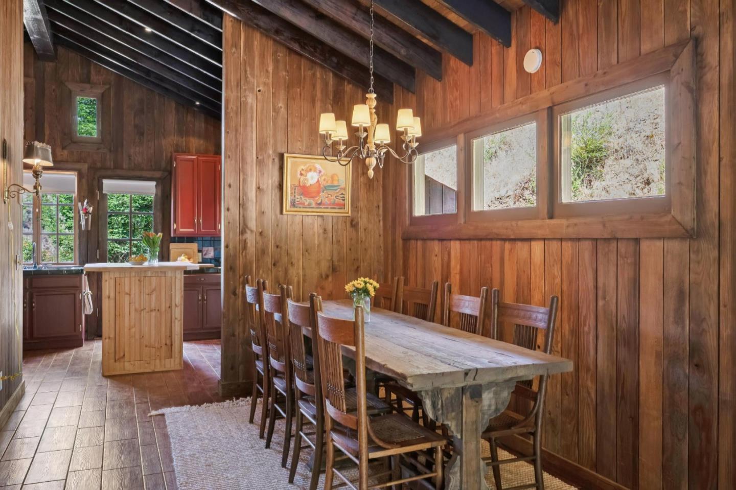 10026 Sycamore Canyon Road Big Sur, CA 93920 - Photo 47 of 67 a view of a patio with table and chairs