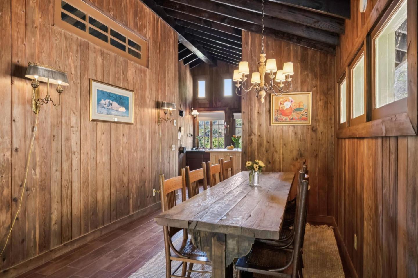10026 Sycamore Canyon Road Big Sur, CA 93920 - Photo 48 of 67 a view of a dining room with furniture window and wooden floor