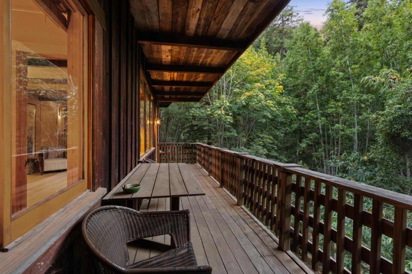 10026 Sycamore Canyon Road Big Sur, CA 93920 - Photo 7 of 67 a view of balcony with wooden floor and iron fence