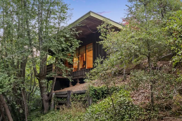 a kitchen with stainless steel appliances granite countertop a stove and a refrigerator