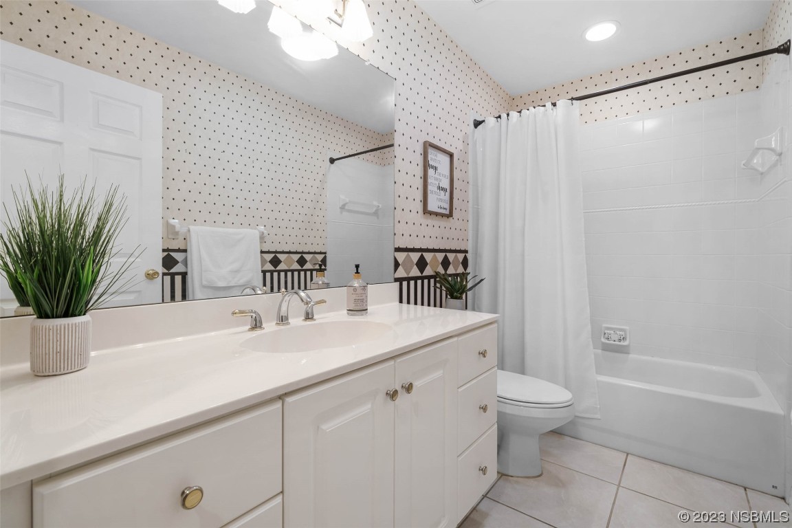 46 Big Buck Trail Ormond Beach, FL 32174 - Photo 14 of 41 a bathroom with a sink a toilet and shower