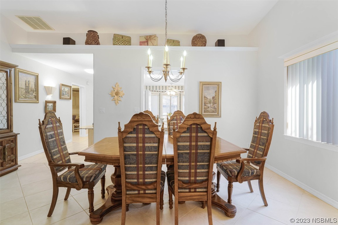 46 Big Buck Trail Ormond Beach, FL 32174 - Photo 16 of 41 a view of a dining room with furniture and window