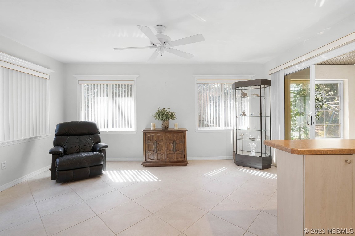 46 Big Buck Trail Ormond Beach, FL 32174 - Photo 20 of 41 a living room with furniture and a large window